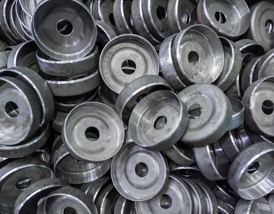 abstract heavy industry production full frame background stamped round workpieces